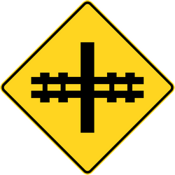 Advertencia de cruce ferroviario sin barreras.
